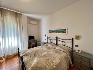 Postel nebo postele na pokoji v ubytování Hotel Marvin