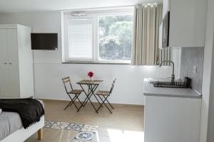 A kitchen or kitchenette at Bosco Mattavona