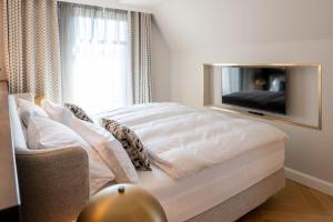 TV a/nebo společenská místnost v ubytování Clounys Hotel