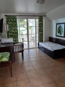 Letto o letti in una camera di Village Sainte Luce - maeva Home