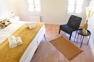 Posteľ alebo postele v izbe v ubytovaní B&B Can Jan