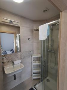 Ein Badezimmer in der Unterkunft Kalinowy Sen II