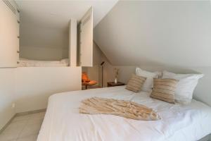 Voodi või voodid majutusasutuse Smeysea - Stylish apartment in Sint-Idesbald toas