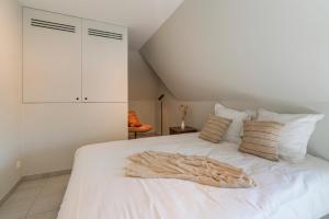 Voodi või voodid majutusasutuse Smeysea - Stylish apartment in Sint-Idesbald toas