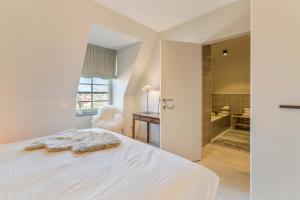 Voodi või voodid majutusasutuse Smeysea - Stylish apartment in Sint-Idesbald toas