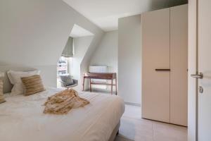 Voodi või voodid majutusasutuse Smeysea - Stylish apartment in Sint-Idesbald toas
