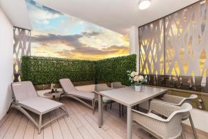 Posezení v ubytování Green Sky Luxury Penthouse Apartment