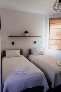 Ein Bett oder Betten in einem Zimmer der Unterkunft Kalinowy Sen II