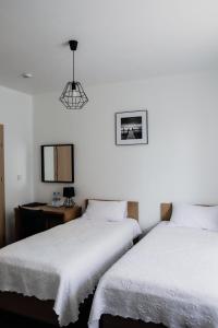Ein Bett oder Betten in einem Zimmer der Unterkunft Kalinowy Sen II
