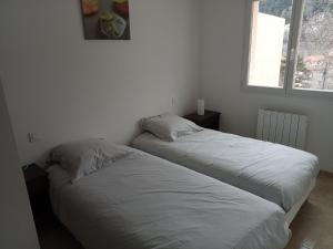 Postel nebo postele na pokoji v ubytování Maison calme