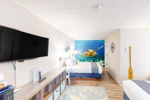 Postel nebo postele na pokoji v ubytování Lamplighter Inn II