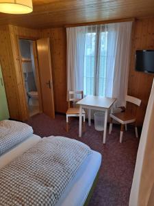 Svetainės erdvė apgyvendinimo įstaigoje Hotel Tell