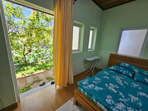 Postel nebo postele na pokoji v ubytování Homestay Sen & Zen Villa Vũng Tàu + 274 fotografií