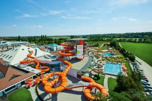 an aerial view of a water park with slides at Sonnenthermen Chalets & Therme included - auch am An- & Abreisetag! in Lutzmannsburg