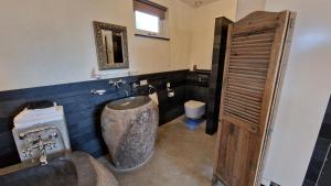 Koupelna v ubytování B&B De Droomhoeve