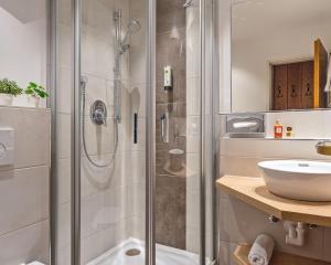 Koupelna v ubytování Hotel Astoria - Alexandra Krämer eK