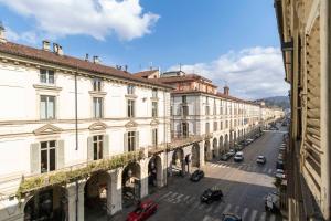 a view of a street in a city with buildings at La Mole Central & Comfy Apartment in Turin