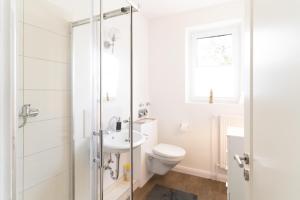 Ένα μπάνιο στο Gemütliche Ferienwohnung in Kiel