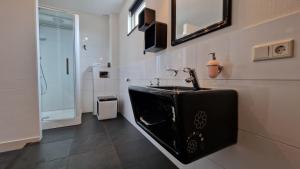 Koupelna v ubytování B&B De Droomhoeve