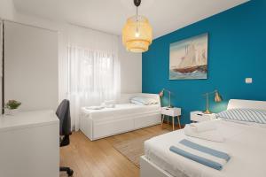 Voodi või voodid majutusasutuse Apartments Cesare with Shared Pool toas