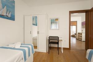 Voodi või voodid majutusasutuse Apartments Cesare with Shared Pool toas