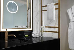 Salle de bains dans l'établissement Hotel Washington