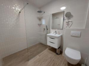 Koupelna v ubytování Seashells Apartments Tribunj