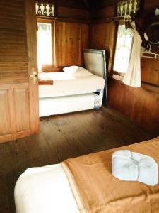 Postel nebo postele na pokoji v ubytování Katumbiri Resort