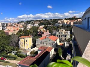 a view of a city with houses and buildings at The Sky of Cagliari in Cagliari
