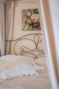 Postel nebo postele na pokoji v ubytování Fenil Conter Cottage & Suite