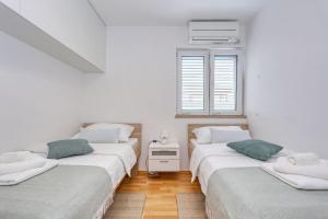 Postel nebo postele na pokoji v ubytování La Manche