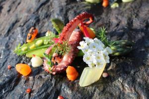 a bunch of vegetables sitting on top of a table at Laguna Park Hotel 4Superior in Bibione