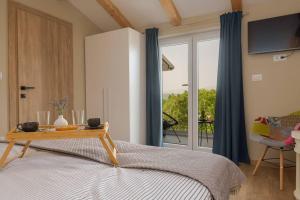 Ένα ή περισσότερα κρεβάτια σε δωμάτιο στο Villa Hakuna Matata by IstriaLux