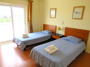Postel nebo postele na pokoji v ubytování Casa Serena