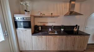 Kuchyň nebo kuchyňský kout v ubytování B&B De Droomhoeve