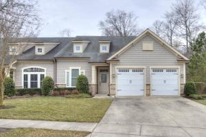 a house with two garage doors in a yard at 38815 Cedar Waxwing La Bay Forest Bethany in Ocean View
