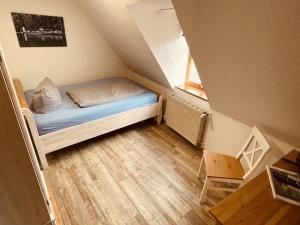 Postel nebo postele na pokoji v ubytování Zum Alten Krug