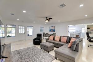 a living room with a couch and a chair at Airy Bradenton Vacation Rental with Patio, Gas Grill in Bradenton
