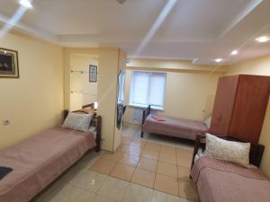 Postel nebo postele na pokoji v ubytování Westend hostel Kyiv