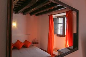 Llit o llits en una habitació de Dom Nuno - Turismo de Habitacao