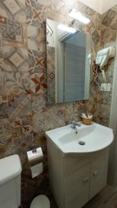 Koupelna v ubytování Ciccina Rooms
