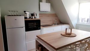 Kuchyň nebo kuchyňský kout v ubytování La Douce'heurt