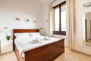 Postel nebo postele na pokoji v ubytování Porcellana Double