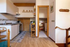 A kitchen or kitchenette at Vicoletto by PortofinoHomes