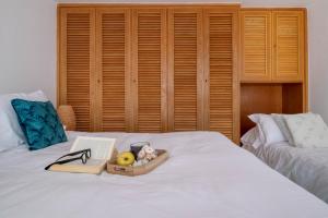 A bed or beds in a room at Vicoletto by PortofinoHomes