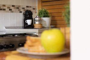 A kitchen or kitchenette at Vicoletto by PortofinoHomes