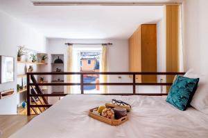A bed or beds in a room at Vicoletto by PortofinoHomes