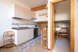 A kitchen or kitchenette at Vicoletto by PortofinoHomes