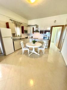 Kuchyň nebo kuchyňský kout v ubytování Seaside Getaway Kriopigi + 5 fotografií