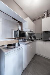 Kuchyňa alebo kuchynka v ubytovaní Le Petillat - Appartement design centre - Idéal Curiste